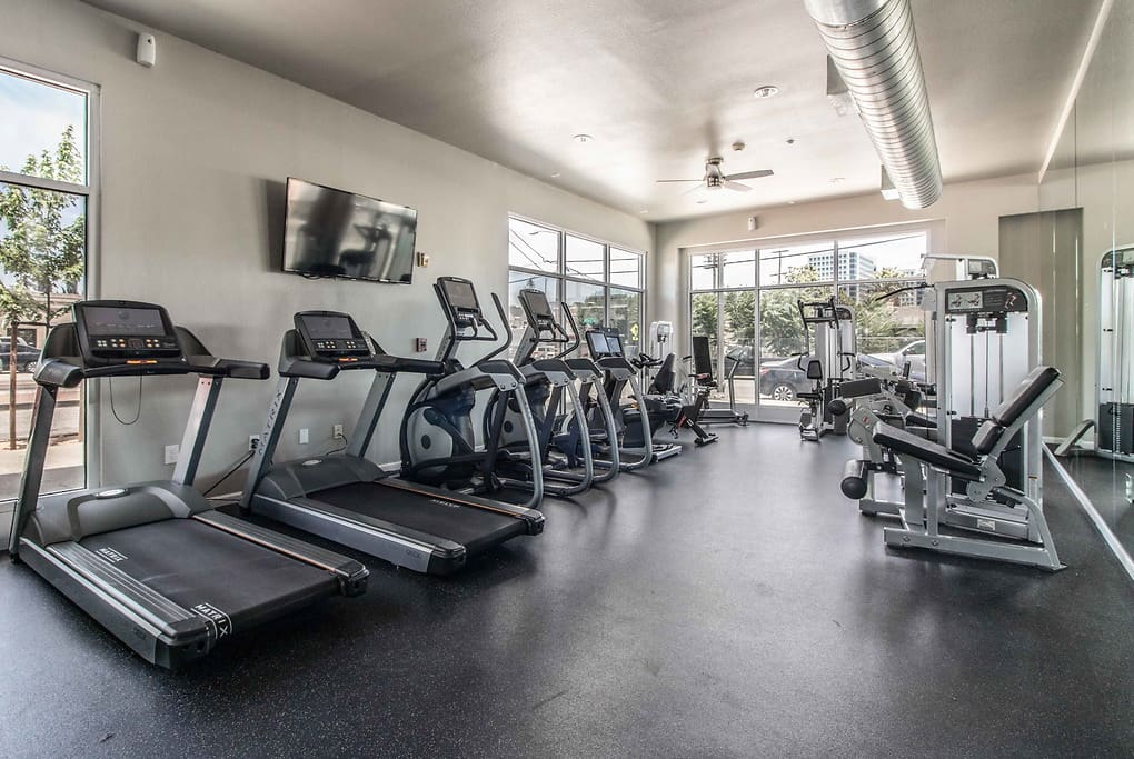 Apartments for Rent in San Jose, CA - Museum Park - Large Fitness Center with Various Cardio Machines and Weight Lifting Equipment